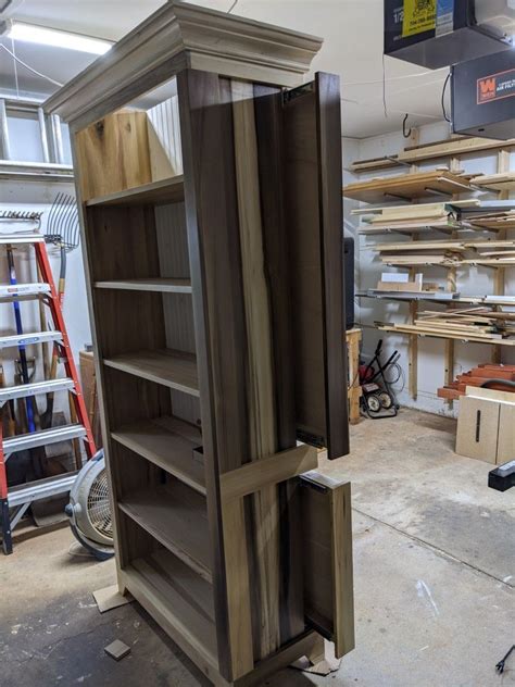 Image result for Bookshelf with Hidden Compartment