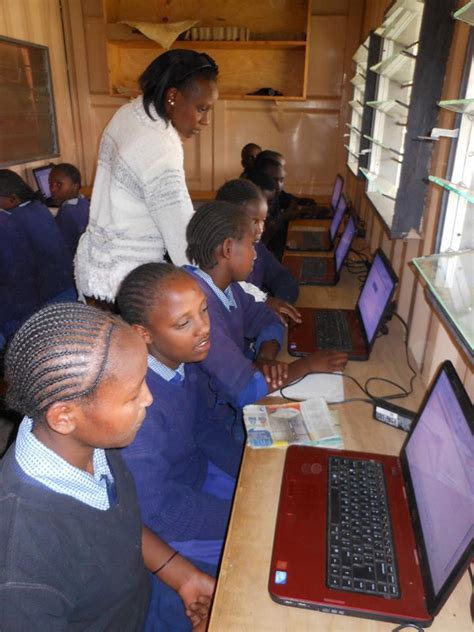 Student Using Computer in Kenya PDF に対する画像結果