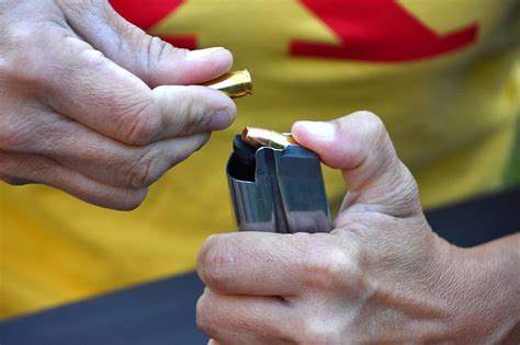 Image result for Loading Handgun Clip