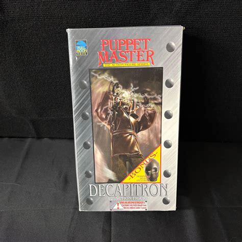 Toradh íomhá ar Puppet Master Decapitron