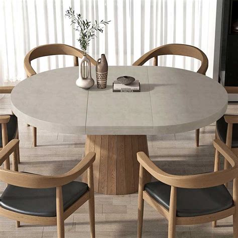 Afbeeldingsresultaten voor Round Extendable Dining Table
