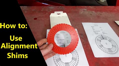 Toradh íomhá ar Shims On Wheel Alignment Machine