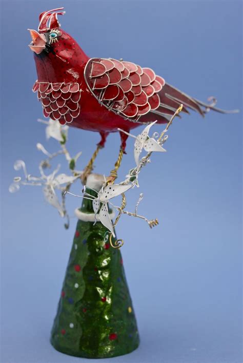 Lighted Cardinal Tree Topper に対する画像結果