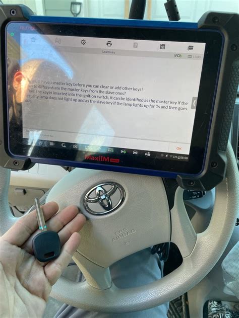 Image result for Programming Toyota Quantum Computer Box with a Paper Clip