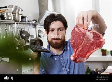 Person Holding A Steak に対する画像結果