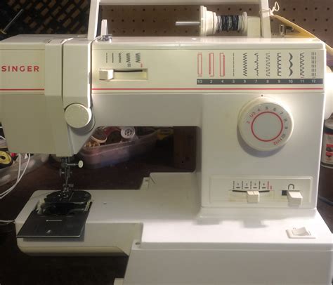 Toradh íomhá ar Singer Sewing Machine 9210