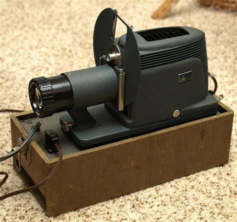Argus Slide Projector 910 എന്നതിനുള്ള ഇമേജ് ഫലം