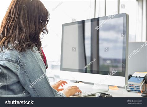 Woman Working On Computer Back View に対する画像結果