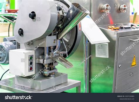 Image result for Tablet Compression Machine Feeder