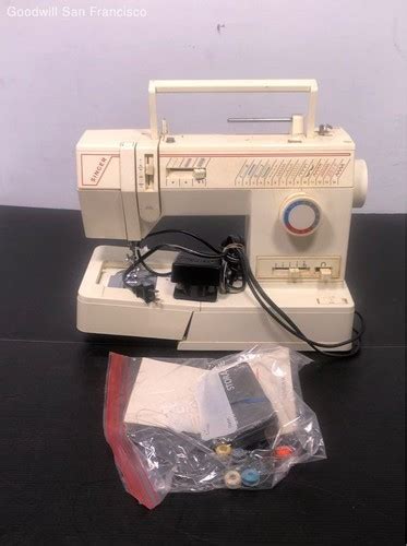 Toradh íomhá ar Singer Sewing Machine 9210