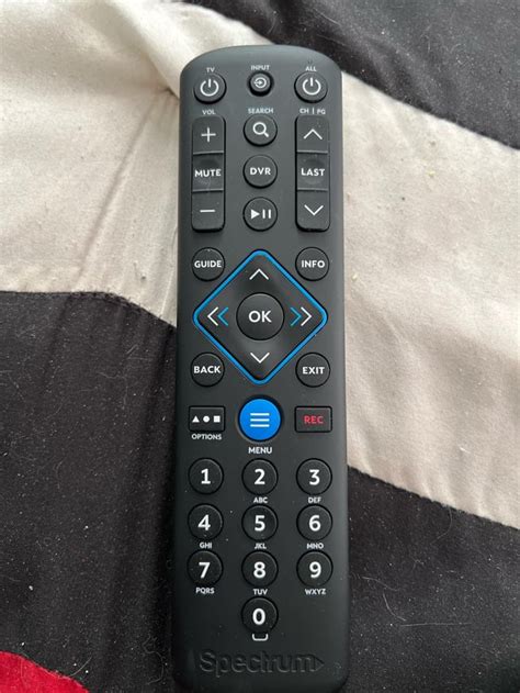 Toradh íomhá ar Yellow Triangle On Spectrum Remote