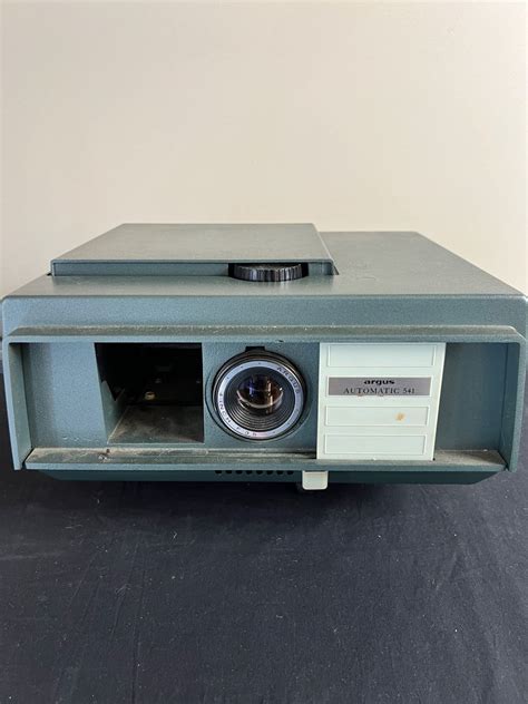 Argus Slide Projector 910 എന്നതിനുള്ള ഇമേജ് ഫലം