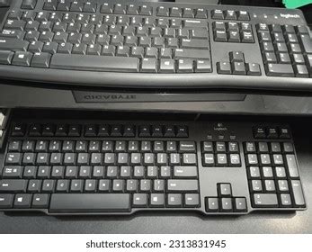Image result for Old QWERTY Keyboard Logitech