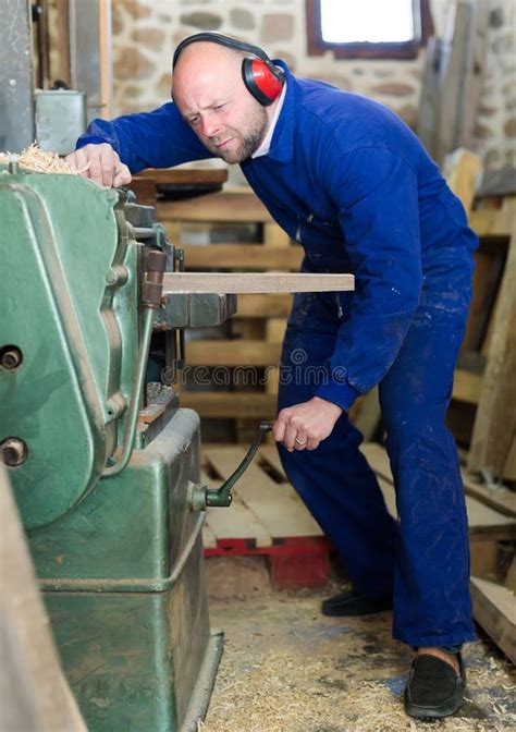 Image result for Man Working On Machine