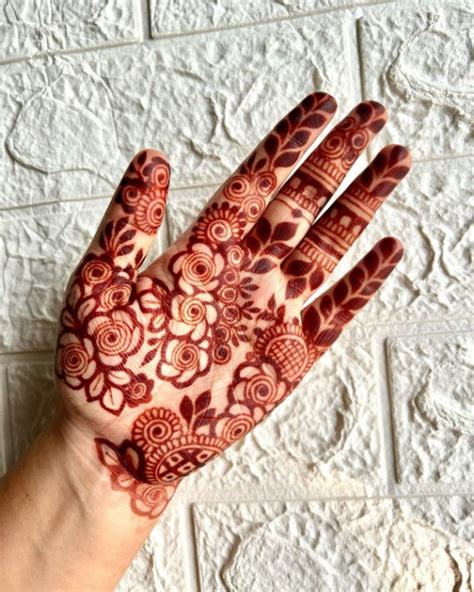40 Modern Front Hand Mehndi Designs : Bold Floral Fusion Mehndi 1 - Fab ...