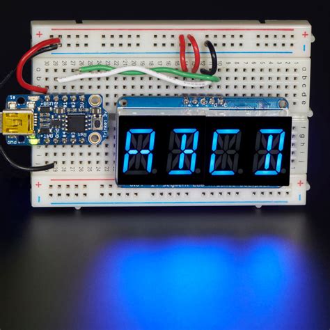 Toradh íomhá ar Alphanumeric Display Red Board