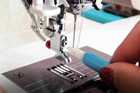 Image result for Thread through Sewing Machine Needle