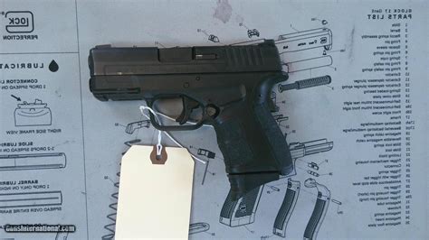 Springfield Armory XD OSP 9Mm Noise Suppressed に対する画像結果
