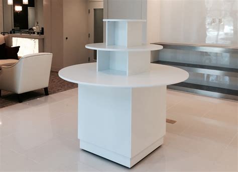 Image result for Retail Display Fixtures Wooden Tiered Roundtables