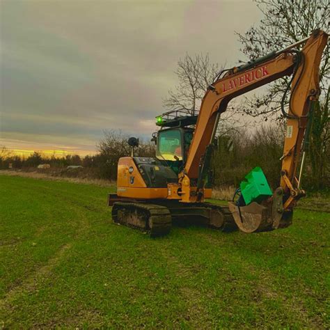 Image result for An Excavator Digging a Trial Pit