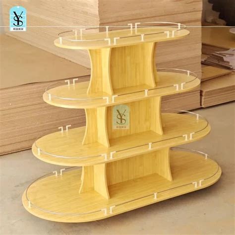 Image result for Retail Display Fixtures Wooden Tiered Roundtables