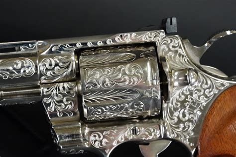 Colt Python Factory Engraved に対する画像結果