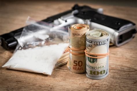 Gun On Table Money に対する画像結果