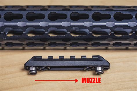 Image result for Mlok vs KeyMod vs Moe