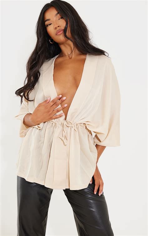 Image result for Low-Cut Tops Revealed