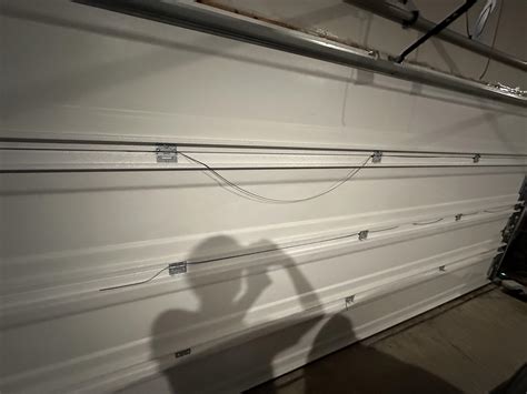 Toradh íomhá ar How to Hang a Garage Door