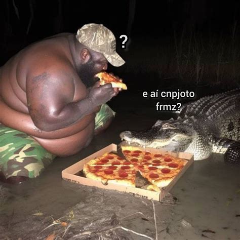 Image result for Guy Eating Pizza in Swamp with Alligator