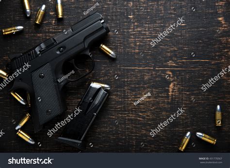 Image result for Wooden Table with Gun Background