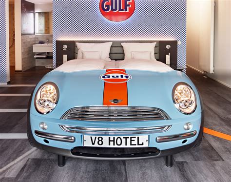V8 Hotel Is One-of-a-Kind Automotive Themed Hotel: Sleeps You In a Car ...