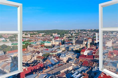Premium Photo | Panoramic window with view of city buildings Opened ...