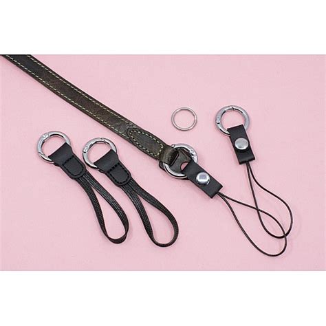 Toradh íomhá ar Camera Strap Adapter