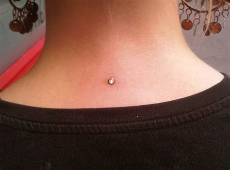 Dermal Piercing: Procedure, Care, Scar Removal, and More - TatRing