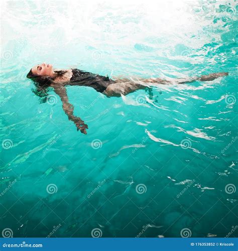 Image result for Woman Floating On Back in Pool Reference