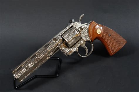 Colt Python Factory Engraved に対する画像結果