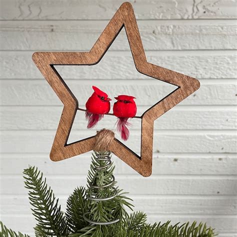 Lighted Cardinal Tree Topper に対する画像結果