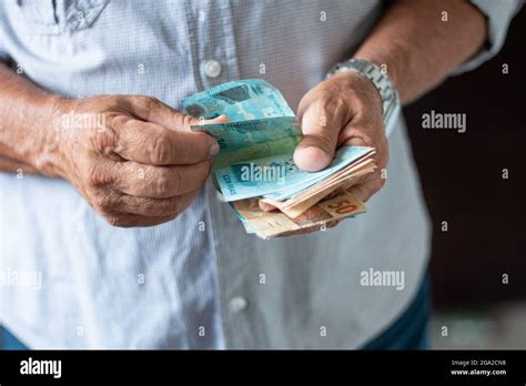 Image result for Man Handing Money