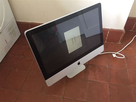 Toradh íomhá ar iMac Stuck On Loading Screen