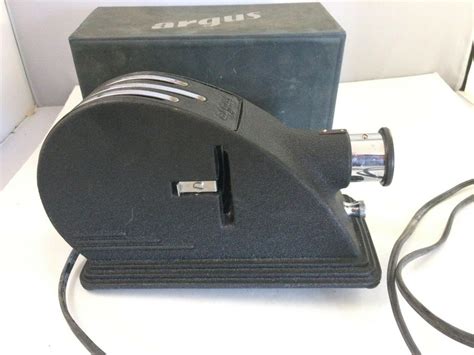 Argus Slide Projector 910 എന്നതിനുള്ള ഇമേജ് ഫലം