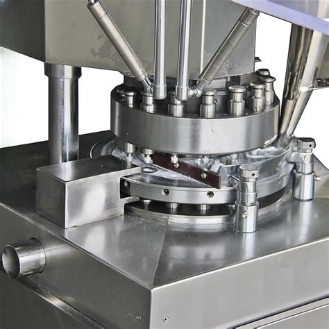 Résultat d’images pour +Tablet Compression Machine at Small SCAL