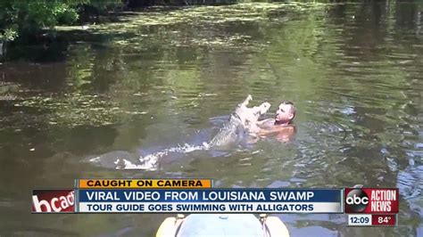 Image result for Guy Eating Pizza in Swamp with Alligator