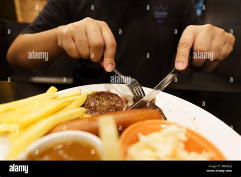 Image result for Image of Someone Putting a Steak in the Ground