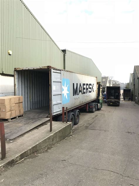 Pails Unloading From Container に対する画像結果