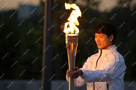 Image result for Man Carrying Torch