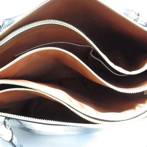 Coach Python Mickie に対する画像結果