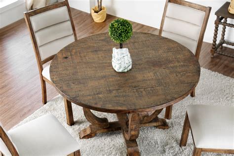 7 Round Rustic Dining Tables For Farmhouse Style Dining Rooms