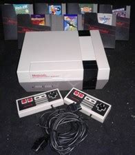 Image result for NES with Gray Gun and Track Pad